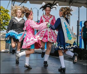 From left, Mary Catherine Scarlet, 16, of Maumee, Chianna Kujawa, 9, of Toledo, Jessica Reighard, 14, of Perrysburg, and Lindsey Lazor, 9, of Perrysburg, perform as part of Molly’s Irish Dancers and the Perrysburg Dance Academy.