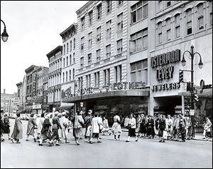 Crowds head to Tiedtke's Department Store downtown in 1953.