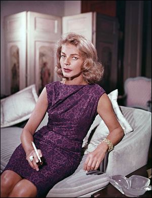 This 1965 file photo shows actress Lauren Bacall at her home in New York. 