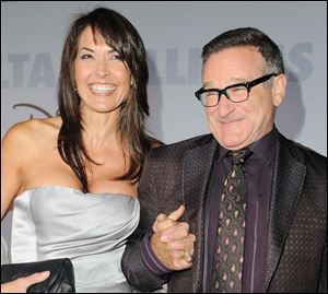 Actor Robin Williams, right, and  his wife Susan Schneider in this 2009 file photo.