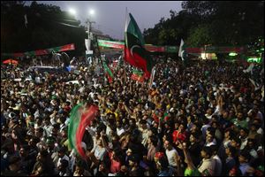 Thousands of opposition protesters on Thursday joined large convoys headed to Pakistan's capital Islamabad for a mass rally to demand the ouster of the prime minister over allegations of vote fraud.