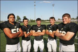 From left, Chaz Westfall, Trevor Hafner, Seth Durham, Gus Dimmerling, and Cale Bonner helped Perrysburg go 7-0 in the NLL last season and win its first title since 2006. The Yellow Jackets also won their first playoff game in school history.