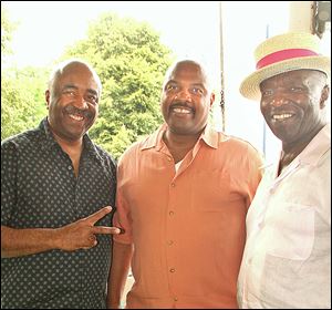 Charles Love, Wilbert McCormick, and Jerome McCormick attend the Detroit Princess Riverboat Cruise fund-raiser.