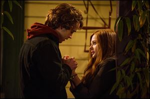 Jamie Blackley, left, and Chloe Grace Moretz star in “If I Stay.”