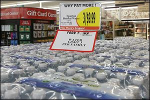 Cases of water are limited to three per family at Food Town in West Toledo. There seemed to be a run on bottled water at some area stores on Thursday as rumbles of another city drinking water crisis swirled on social media and elsewhere. 