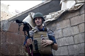 In an act of revenge for U.S. airstrikes in northern Iraq, militants with the Islamic State extremist group have beheaded American photojournalist James Foley.