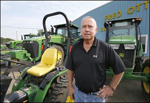 Darrel Ott, grandson of Fred Ott and one of the current owners, said even though his busy season is typically after tge harvest, he’s noticed more measured spending. ‘‍You never know until they get their yields, but the prices are down and it’s definitely going to affect [farmers’] buying decisions,’ Mr. Ott said.