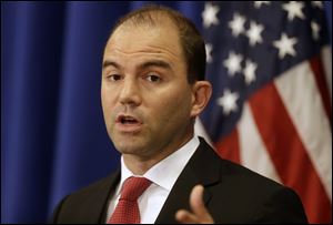 Deputy National Security Adviser for Strategic Communications and Speechwriting Ben Rhodes speaks to reporters during a press briefing Friday in Edgartown, Mass., on the island of Martha's Vineyard.