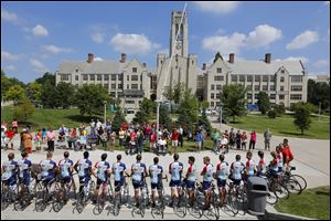 Members of Pi Kappa Phi from universities across the country are greeted by people with disabilities at the student union at the University of Toledo on July 30, 2013. The cyclists were part of the Push America, Journey of Hope program.
