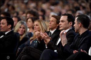 Jim Parsons poses in the audience at the 66th Primetime Emmy Awards at the Nokia Theatre L.A.