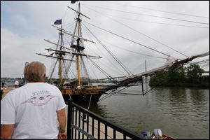 Bill Duwve of Erie, Mich., looks over the U.S. Brig Niagara, which came from Erie, Pa., to the Toledo Antique and Classic Boat Show.