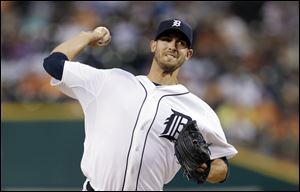 Detroit Tigers pitcher Rick Porcello throws against the New York Yankees in the first inning.