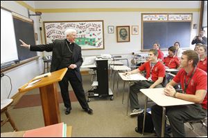Bishop Daniel E. Thomas visits students at Central Catholic High School near downtown Toledo after the announcement of his new position in Toledo.