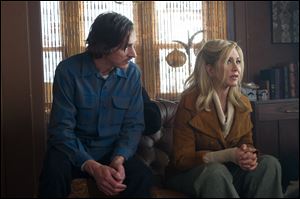 John Hawkes, left, and Jennifer Aniston in a scene from 