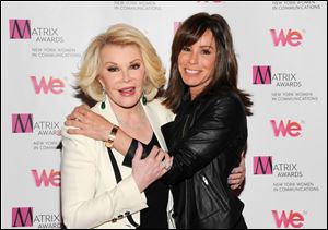 Joan Rivers and daughter Melissa Rivers at the 2013 Matrix New York Women in Communications Awards in New York.