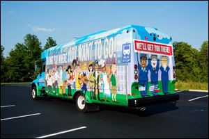 Lake Erie Transit’s vinyl wrapped bus, which debuted in Monroe in August, will start traveling in Bedford and Bedford Township. Some of the characters were inspired by real patrons and employees.