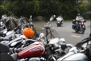 Bikers arrive before the start of the third annual Ride the Fin at Toledo Harley Davidson in Sylvania.