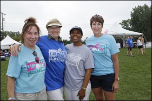 Committee members Lynn Kordash, left, Joey Apgar, Lisa McDuffie, and Jeannie Hylant at the 23rd Annual Pollyball Tournament, in celebration of the life of Polly Hylant-Tracy.
