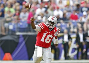 Ohio State quarterback J.T. Barrett was named the Big Ten’s co-freshman player of the week for his performance against Navy.