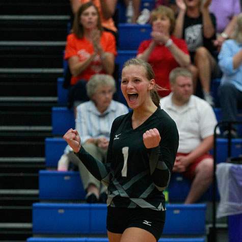 SPT-elmwoodvball03pvOtsego-s-Abby-Hesselschwardt-reacts-to-a-point