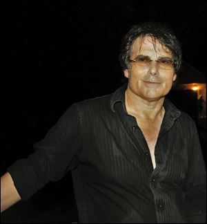 This undated photo provided by Sally J. Irwin shows Jimi Jamison in Chicago. Jamison, who sang lead on Survivor hits such as 
