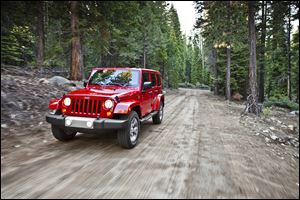Jeep plans updates for the 2015 models of its Toledo-built Wrangler, shown above, and Cherokee.