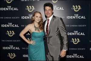 Actress Erin Cottrell, left, and actor Blake Rayne, star in 'Identical.'