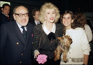 Joan Rivers, center, with her husband Edger Rosenberg, left and daughter Melissa, at Fox Broadcasting Studios in Los Angeles in May, 1987.