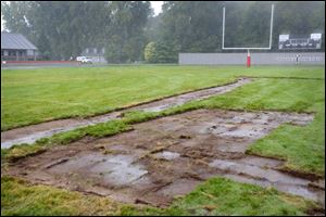 Sod has been removed from Grogan's Towne Field at Bedford Community Stadium where grass or weed killer was sprayed causing damage to the turf.