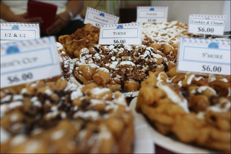 Enlarge | Buy This Photo Concessions sported elaborate funnel cakes ...