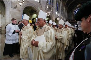 Bishops process into Our Lady, Queen of the Most Holy Roasary Cathedral for the installation ceremony of Toledo's new Bishop, the Most Reverend Daniel E. Thomas.