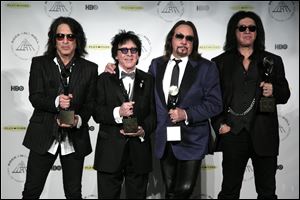 Hall of Fame Inductees Kiss original band members Paul Stanley, Peter Criss, Ace Frehley, and Gene Simmons appear in the press room at the 2014 Rock and Roll Hall of Fame Induction Ceremony.