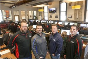 Ryan Bristol, director of pricing; Nate Wilson, director of operations; Chris Keller, vice president of transportation solutions; and Zac Cook, operations manager, oversee a team of 51 people at U.S. Xpresss Logistics in Toledo. 
