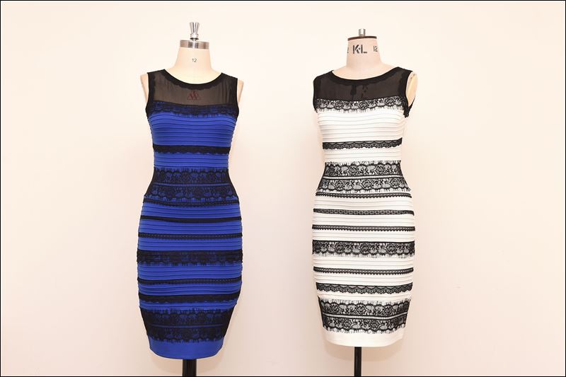 The two-tone dress, left, alongside an ivory and black version, made ...
