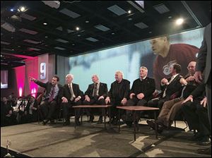 From left, Dr. Murray Howe sits near his father, Gordie Howe, who is joined on stage with son Marty Howe and NHL legends such as Bobby Hull, his son Brett, who is third overall in NHL scoring, and Wayne Gretzky, at a dinner in Gordie Howe’s honor in Canada.