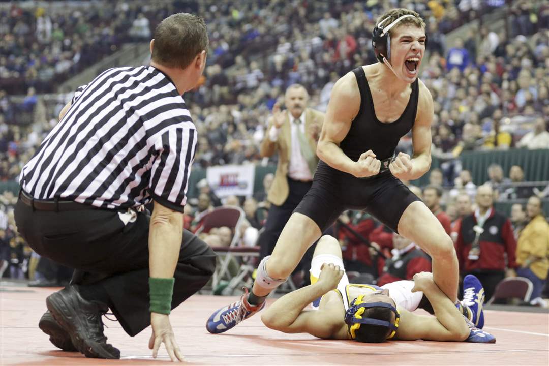 SPT-statewrestlingDelta-wrestler-Jake-Spiess-celebrates-after-pinn