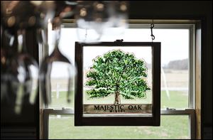 The Majestic Oak Winery is named for an old white oak tree that towers over the Rufenacht’s pasture near Grand Rapids, Ohio. They grow four varieties of grapes on two acres.