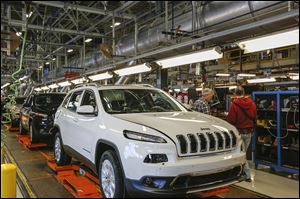 The line of fully assembled Jeep Cherokees at the Toledo Assembly Complex.