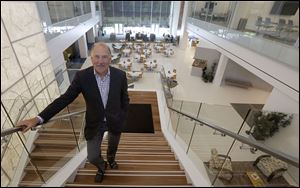 Chief Executive Officer Kurt Darrow, on the steps leading down to the main atrium, said this new headquarters ‘screams style, fashion, design, and a company looking to the future.’
