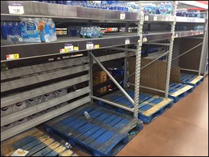 Water shelves are becoming bare at Walmart in Rossford.