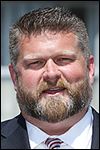 Hughes wins new term leading Dems