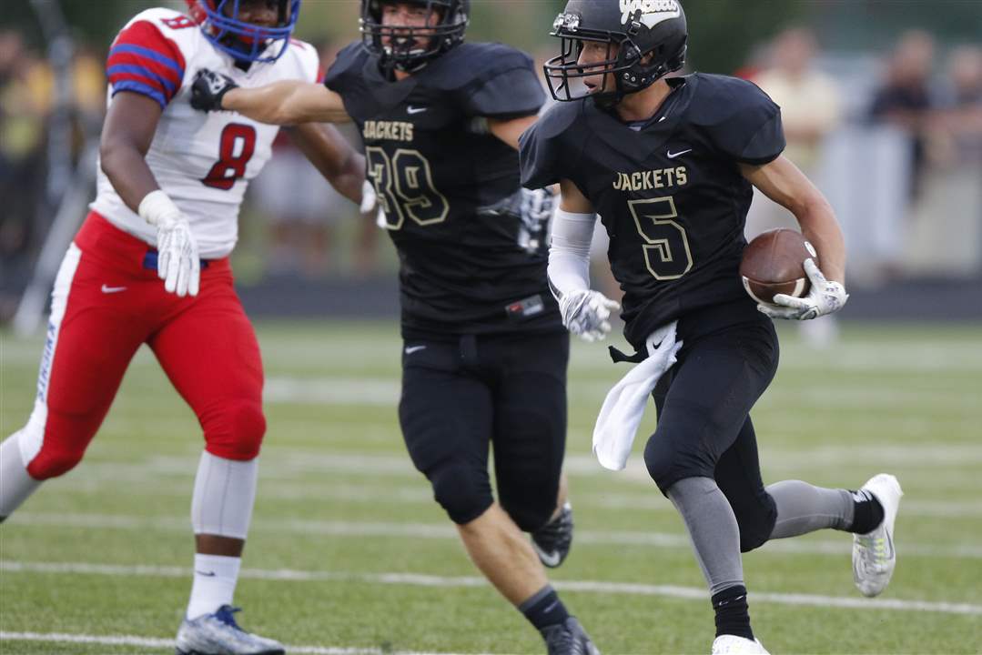 IN PICTURES Perrysburg 42, St. Francis 0 The Blade