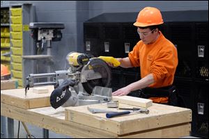 A Penta Career Center student uses a circular saw on a project in the school’s construction carpentry program.
