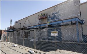 The former Office Depot at  5105 Monroe St. is eyed as the site of the Fresh Thyme Farmers Market.
