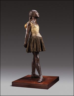 A sculpture entitled '‘Little Dancer Aged Fourteen' by Edgar Degas.