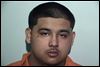Man arrested in North Toledo shooting death