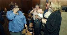 PONTIAC, Mich. — Two Detroit-area nurses jointly adopted five children on Thursday, closing a case that started when they challenged Michigan’s restrictions on adoption and helped pave the way for the landmark U.S. Supreme Court decision allowing