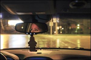 Lyft driver Ashley Eby drives to The Blade in downtown Toledo. Ms. Eby said it was her first night as a Lyft driver, and she had about 10 rides over the course of the night.