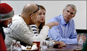 Portman hears stories of recovery