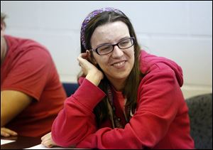 Emma Bedan, of Cincinnati, listens during a support class in the Defiance College's ASD Affinity Program for college students with autism.